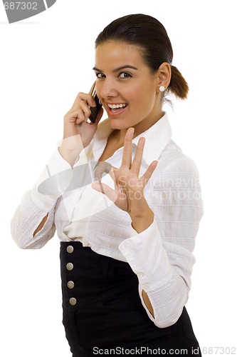 Image of businesswoman on the phone ok sign