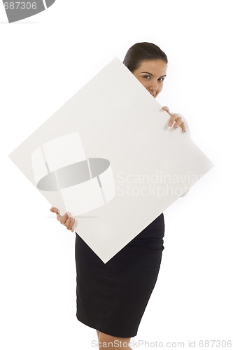 Image of businesswoman holding a blank board