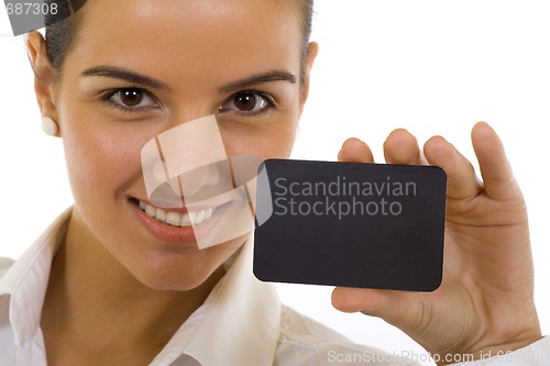 Image of woman with big smile displaying blank business card