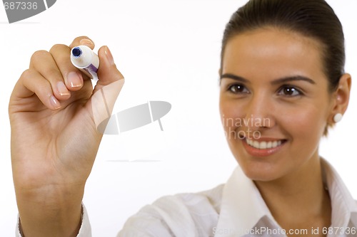 Image of businesswoman writing with marker