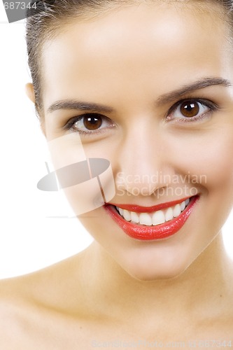 Image of studio shot of a smiling woman