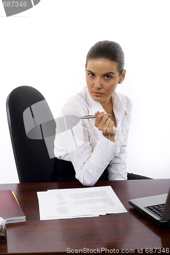 Image of Young businesswoman in the office