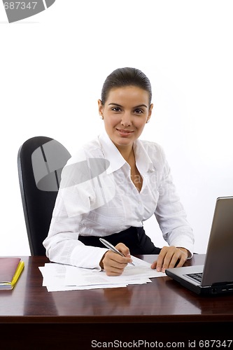 Image of business woman signing a contract