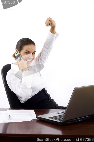 Image of business woman at her office