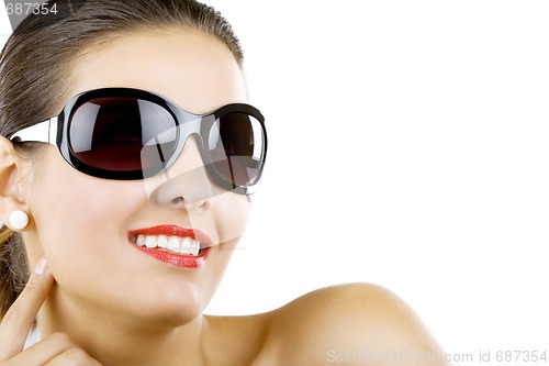 Image of beautiful woman wearing sunglasses