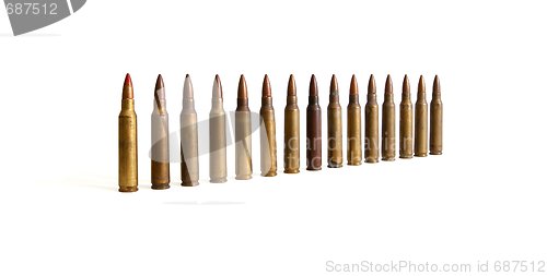 Image of Row of standing M16 cartridges converging in perspective isolated