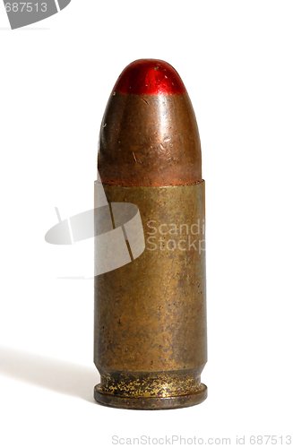 Image of Single standing red-tipped tracer 9mm Parabellum cartridge isolated