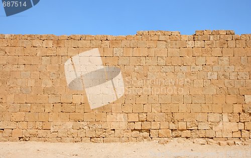 Image of Ancient yellow stone wall texture