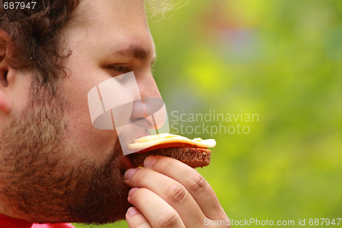 Image of Man with sandwich