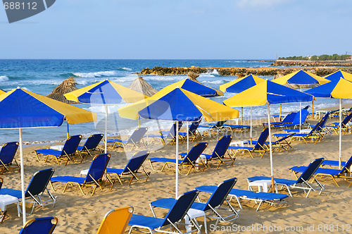 Image of Sunbeds and beach umbrellas