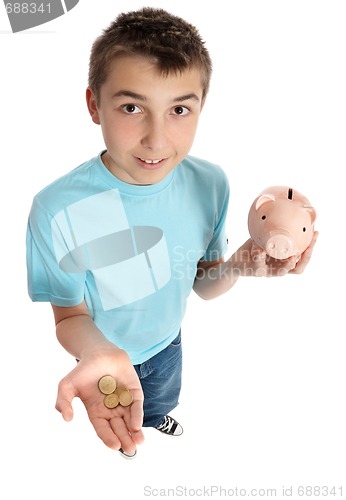 Image of Boy holding coins for money box