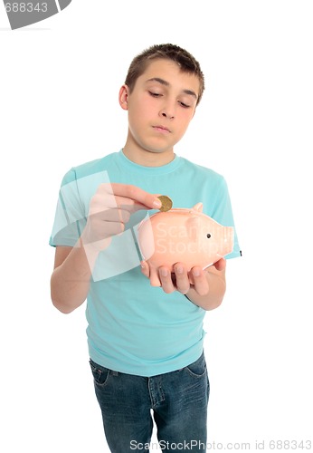 Image of Boy saving coins for a rainy day