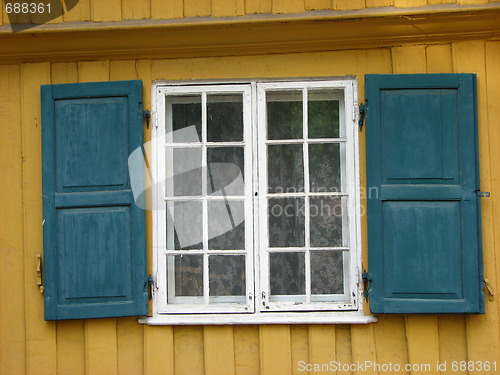 Image of Open Shutters on Old Building 