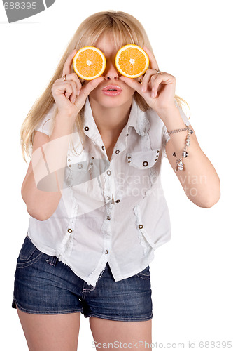Image of Portrait of the funny girl with oranges. Isolated
