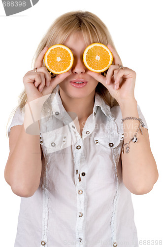 Image of Funny girl with oranges. Isolated on white