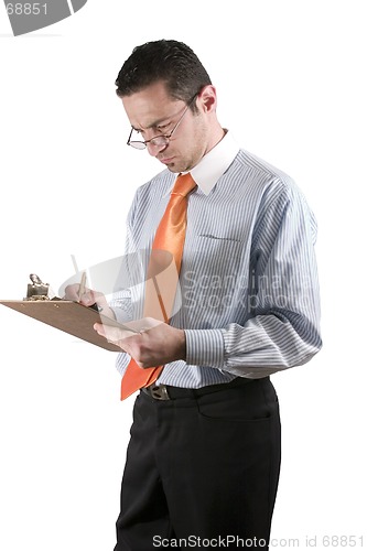 Image of Businessman with clipboard on hand