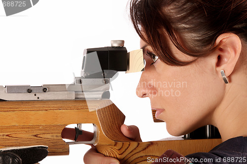 Image of woman aiming a pneumatic air rifle