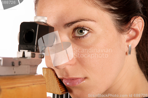 Image of woman aiming a pneumatic air rifle