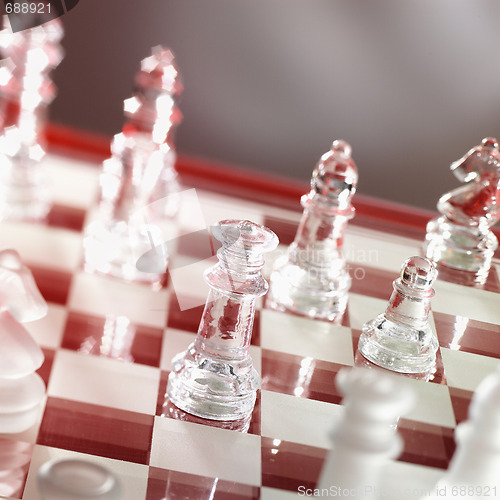 Image of chess game in warm red