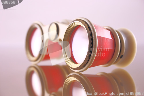 Image of Old opera glasses on the blacked out glass