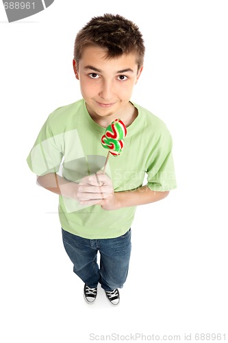 Image of Boy holding a lollipop