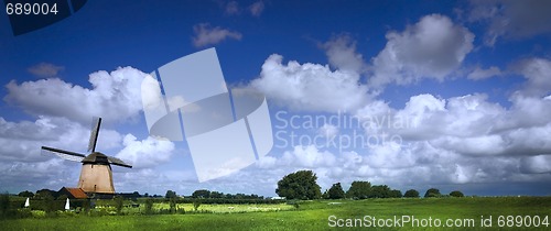 Image of windmill in Dutch landscape