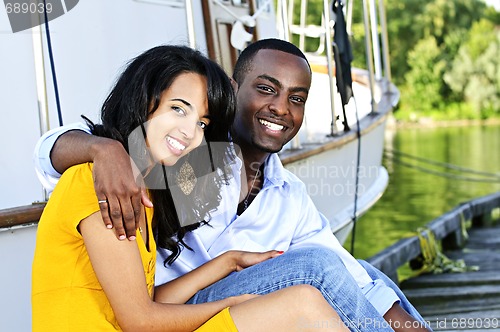 Image of Happy couple in front of yacht