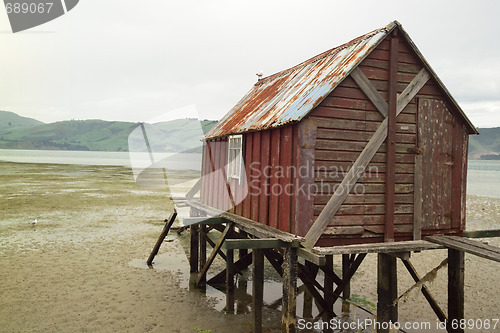 Image of boathouse in tide