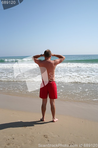 Image of Man looking out over the sea
