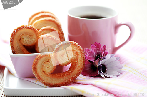 Image of cup of coffee and cookies