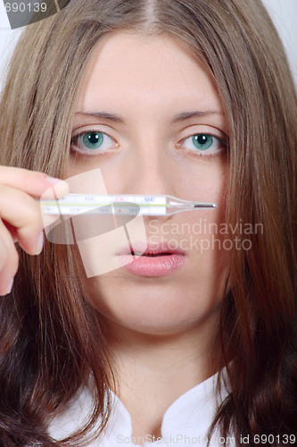 Image of The nice girl with a thermometer