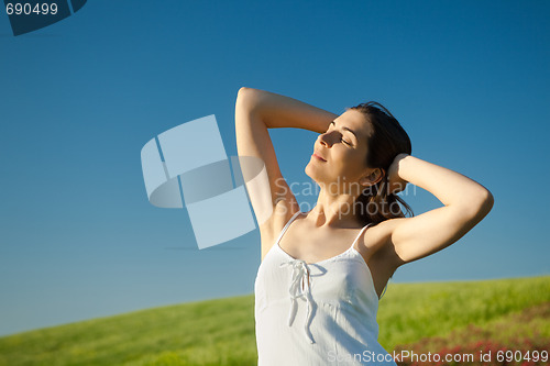 Image of Young woman relaxing