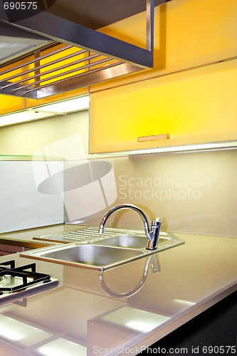 Image of Yellow kitchen sink