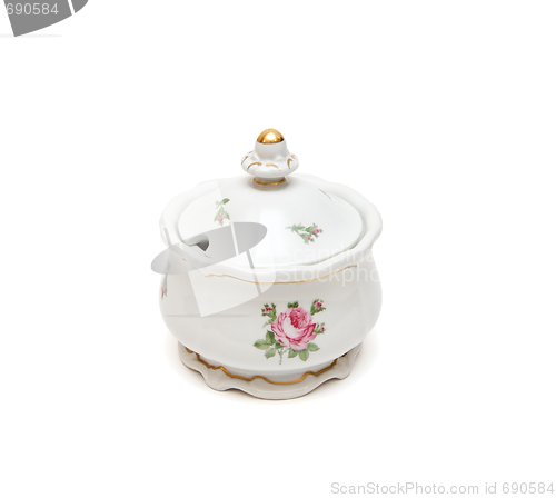 Image of White porcelain sugar basin with roses isolated