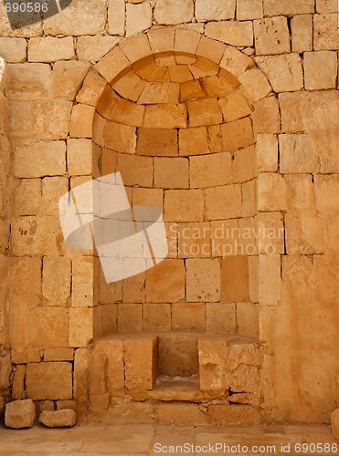 Image of Ancient stone wall with arched niche