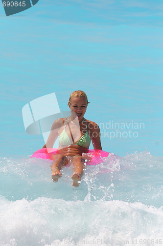 Image of Woman enjoying the sea