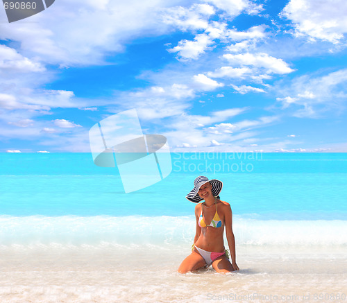 Image of Woman enjoying the sea