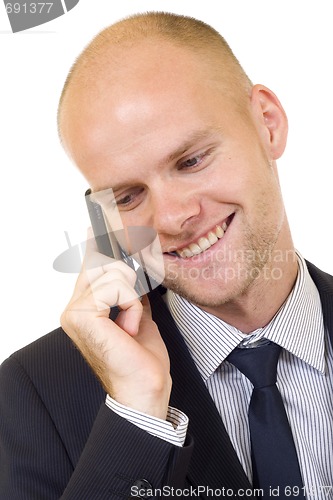 Image of successful businessman making phone call