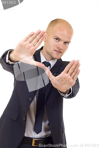 Image of Businessman making a frame with his hands