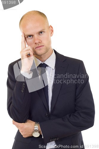 Image of Young businessman thinking