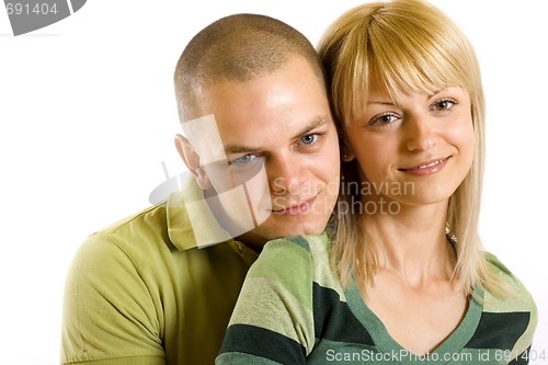 Image of Happy young man and woman standing together