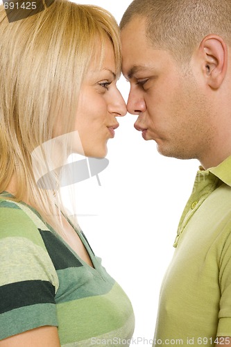 Image of Closeup portrait of a happy young couple