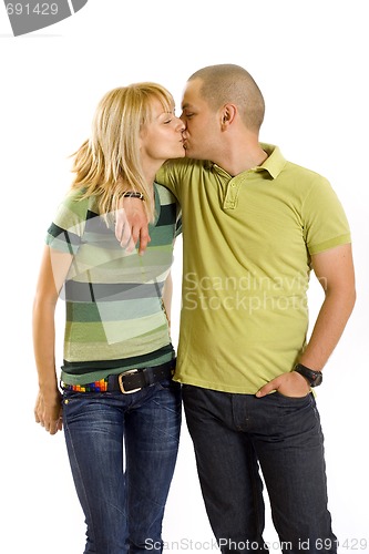 Image of young couple kissing, studio shot