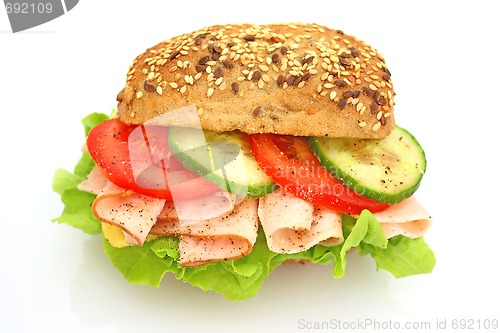 Image of Fresh sandwich with ham and cheese and vegetables