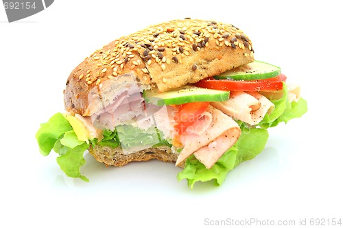 Image of Fresh sandwich with ham and cheese and vegetables