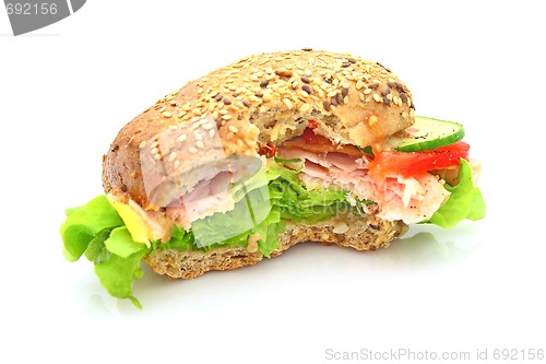 Image of Fresh sandwich with ham and cheese and vegetables