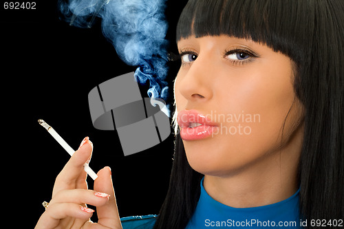 Image of Portrait of the cute woman with a cigarette