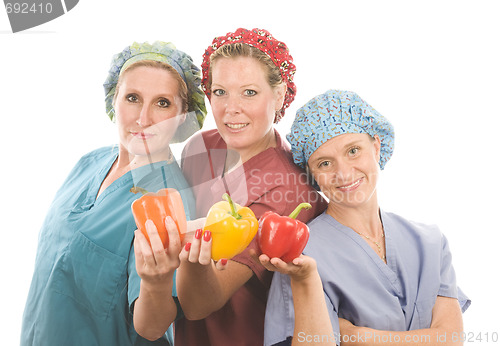 Image of group of nurses with healthy fruits and vegetables