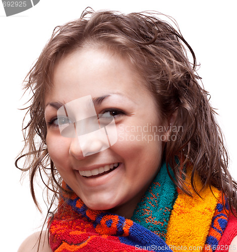 Image of Beautiful girl, smiles in colour towel