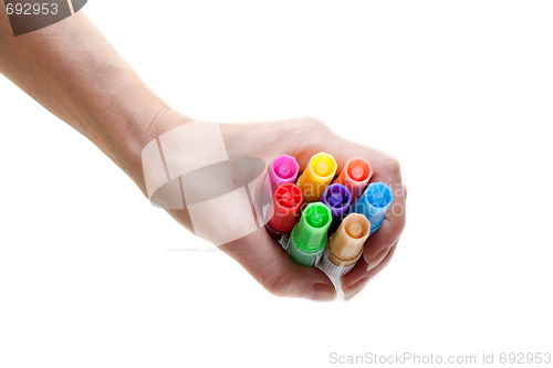 Image of Soft-tip pens in feminine hand